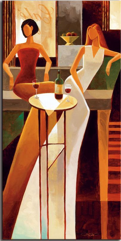 two women sitting at a table with drinks in front of them, one is wearing a white dress