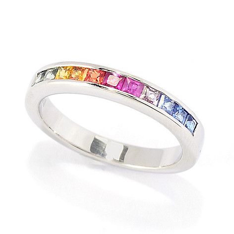 Slip this ring on to adorn your finger in a dazzling band of color! Radiant cut sapphires in a rainbow of colors including blue  pink and yellow stretch across the front of the piece in channel settings. Just above and below the stones you get a glimpse of the polished metal  which comes in your choice of 18K vermeil or platinum plated sterling silver. Wear this ring by itself to add a splash of color to your ensemble  or stack it with others in your collection to create a look that's unique to Sapphire Band Ring, Sapphire Band, Radiant Cut, Pink And Yellow, Band Ring, Color Splash, Band Rings, Platinum, Sapphire