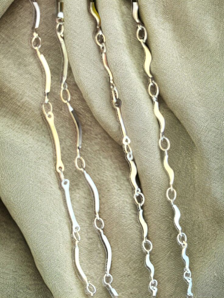 Belly Chains are a stylish way to accentuate your curves? Crafted from stainless steel, this chain is both safe and stunning. Add our chic charms to your chain to create a personalized accessory that's perfect for everyday wear or special occasions! WHAT'S INCLUDED: One Belly Chain along with a 4 inch extender! (FOR EXAMPLE: if you choose size Medium it will be a total of 38 inches with 34 inches being the tightest setting) 18K Gold Plated Stainless Steel / Silver Plated Stainless Steel Lobster Modern Metal Chain Necklace With Silver Chain, Modern Silver Chain Metal Necklace, Chic Silver Chain Necklace With Rectangular Links, Modern Metal Necklace With Cable Chain, Modern Silver Chain Necklace With Adjustable Chain, Chic Silver Necklace With Rectangular Links, Chic Silver Chain Necklace For Gift, Chic Silver Chain Necklace As Gift, Chic Silver Chain Necklace Gift