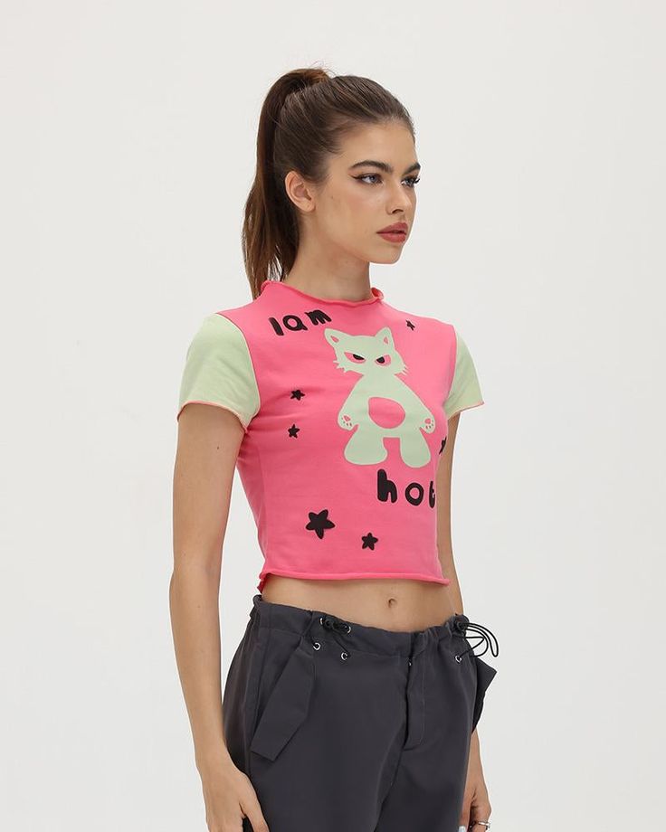 Model (WearingXS):• Height: 171cm | Bust: 83cm | Waist: 59cm | Hips: 89cmDetails: Pink T-shirt with "I am Hobby" meme graphic printTop Length: CroppedSleeve Length: Short SleevesMaterials:95% Cotton + 5% Spandex Y2k Crew Neck T-shirt With Character Print, Fitted Fun T-shirt With Screen Print, Y2k Style Graphic T-shirt For Spring, Spring Y2k T-shirt With Graphic Design, Spring Y2k Style Graphic T-shirt, Spring Y2k Graphic T-shirt, Spring Y2k Graphic Design T-shirt, Fitted Graphic Tee With Cartoon Print, Y2k Cartoon Print Tops For Streetwear