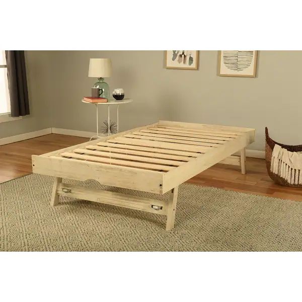 a wooden bed frame sitting on top of a rug