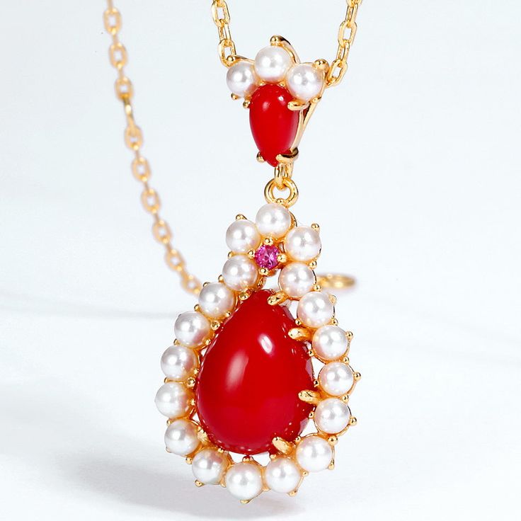 Style: Women Metal: S925 Sterling Silver Plated 18K Gold Pearl Type: Uncultured Pearl Color: White Pearl Size: 2-2.2mm Red Corundum: 3*3mm Red Coral: 10*7mm Silver Weight: 1.51g Replica Jewelry, Titanium Bracelet, Coral Pendant, Alloy Earrings, Bohemian Necklace, Pearl Types, Lariat Necklace, Pearl Color, Pearl Size