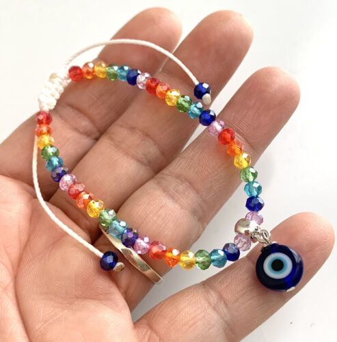 Evil Eye Charm On Seven Chakra Rainbow Glass Bead Adjustable Bracelet Wax Cord | eBay The Seven Chakras, Seven Chakra, Seven Chakras, Spiritual Protection, Rainbow Glass, Evil Eye Charm, Evil Eye Jewelry, Eye Jewelry, Lucky Charm