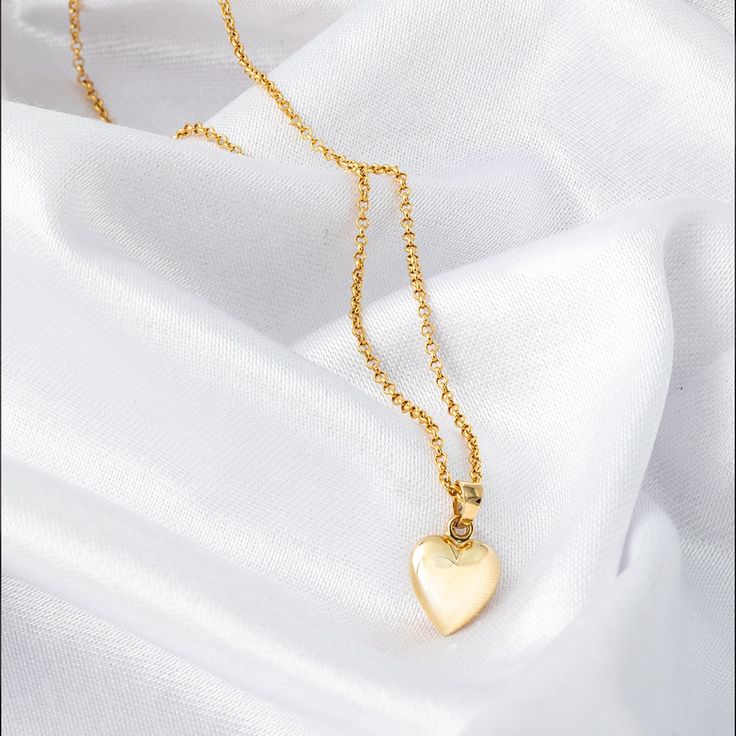 Perfect as a Valentine's gift or a heartfelt present for someone special, this love pendant is sure to make a lasting impression. Wear it alone for a subtle statement or layer it with other favorites for a trendy look. Show your love and appreciation with this beautiful 14k gold 3D heart necklace. *Free Express International Shipping *Free returns within 14 days from the order date. *14K solid gold chain is included if you select. NEXT BUSINESS DAY SHIPPING! PRODUCT DETAILS *The product is made of 100% 14k Solid Gold and it has a 14K or 585 stamp on item. (We don't sell filled or plated jewelry) *The package includes a gold certificate.  *The product includes 14K solid gold chain. *Every package comes in a gift box. *14K gold indicates that the product is produced from 58% pure gold. *Chai Heart Cut Locket Necklace For Valentine's Day, Dainty Heart Pendant Locket Necklace With Charm, Dainty Heart Locket Necklace With Charm, Valentine's Day Heart Cut Locket Necklace With Heart Charm, Valentine's Day Heart Shaped Locket Necklace With Charm, Valentine's Day Heart Cut Locket Necklace, Heart Cut Locket Necklace With Heart Charm For Anniversary, Heart Cut Locket Necklace With Heart Charm As Gift, Heart Cut Locket Necklace As A Gift