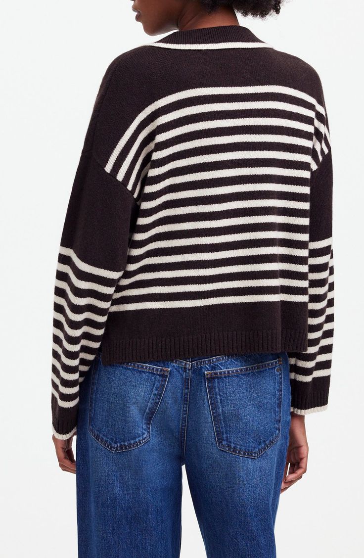 Knit in a cozy blend of cashmere and wool, this striped polo sweater channels vintage vibes with its ribbed johnny collar, dropped shoulders and relaxed fit. 21 1/2" length (size Medium) Johnny collar Long sleeves 70% recycled cashmere, 30% recycled wool Dry clean Imported