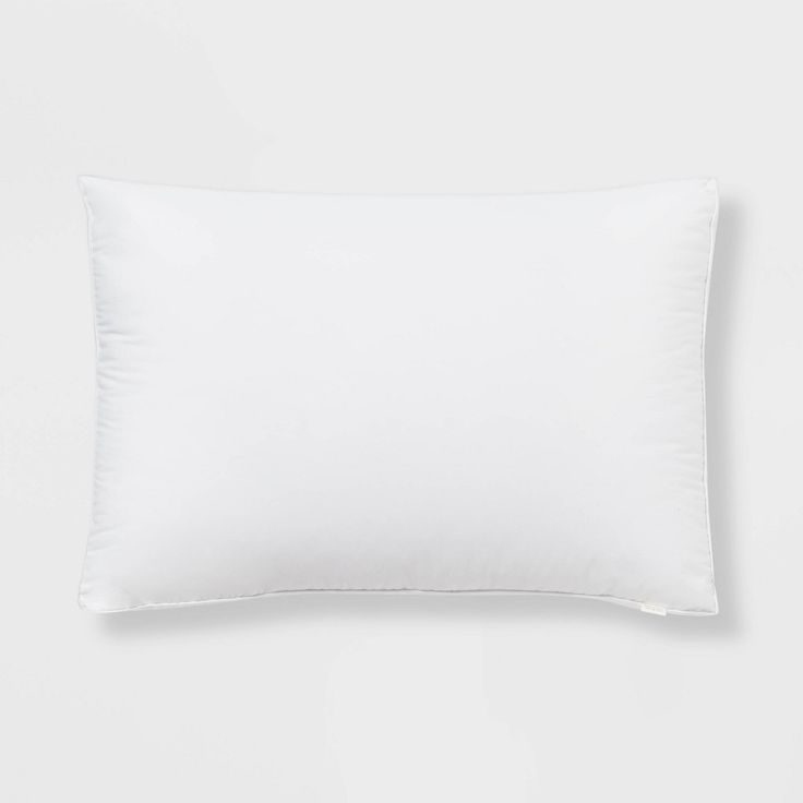 a white pillow on a white background