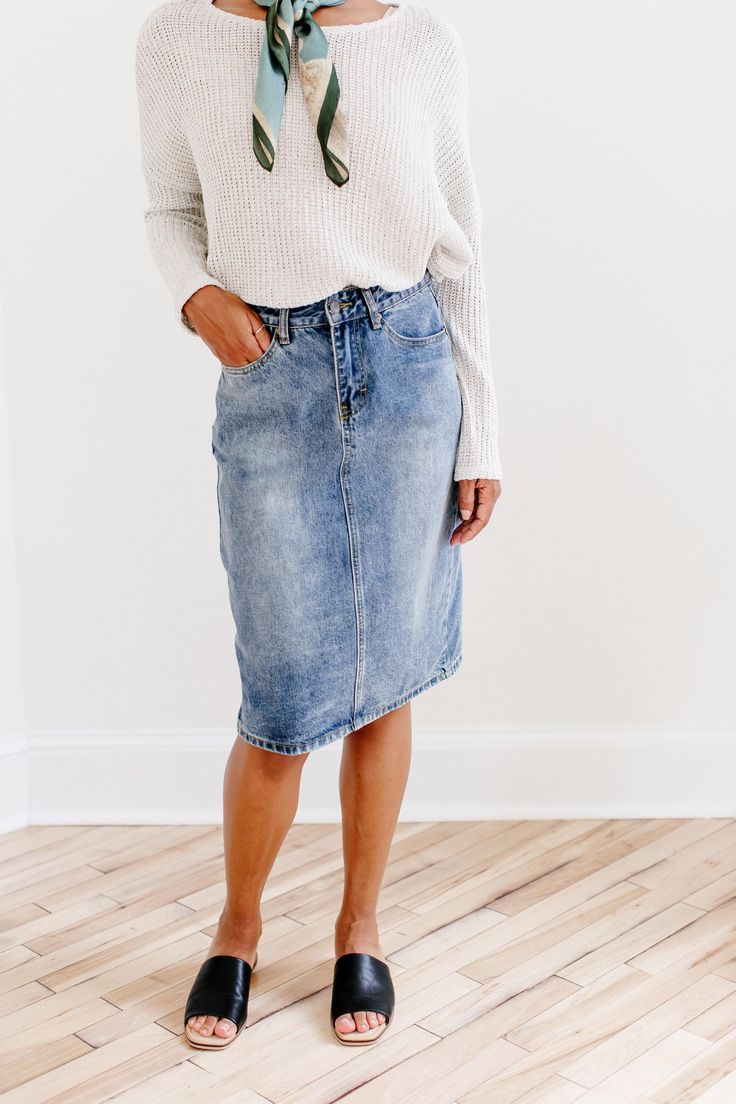 The 'Kyra' is another one of our very own exclusive denim skirts. Designed with everyday wear in mind, this skirt will pair well with just about any casual top in your wardrobe! This knee length denim skirt is 100% cotton and does not have stretch giving it a vintage vibe we love! Every woman needs a classic denim pencil skirt in her closet and this skirt is an excellent choice! Available in a classic light wash or statement black. 100% Cotton Machine Wash Cold Gentle Cycle Do Not Bleach Hang to Fall Denim Skirt With Lined Detail, Casual Medium Wash Denim Midi Skirt, Casual High Waist Cotton Pencil Skirt, Relaxed Denim Skirt For Fall, Relaxed Fit Denim Skirt For Fall, Denim Relaxed Fit Skirt For Fall, Casual Dark Wash Midi Denim Skirt, Medium Wash Cotton Skirt For Fall, Denim Lined Skirt In Dark Wash