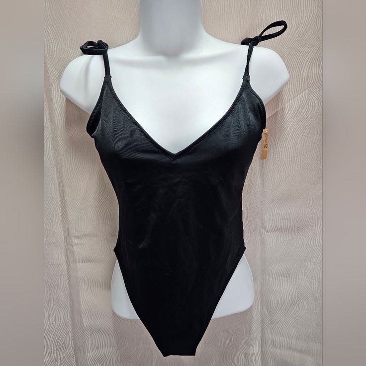 Beautiful, Delicate, And Sexy Victorias Secret One-Piece Black High Cut Bathing Suit. New With Tag Size Small Reg. Price $60 Fitted Triangle Top Bodysuit For Night Out, Black V-neck Swimwear For Evening, Spring Party Bodysuit With Triangle Top, Chic Triangle Top Bodysuit For Night Out, Chic Bodysuit With Triangle Top For Night Out, Fitted Victoria's Secret Bodysuit For Summer, Black Triangle Top Bodysuit For Parties, Victoria's Secret Black Swimwear, Chic Party Swimwear By Victoria's Secret