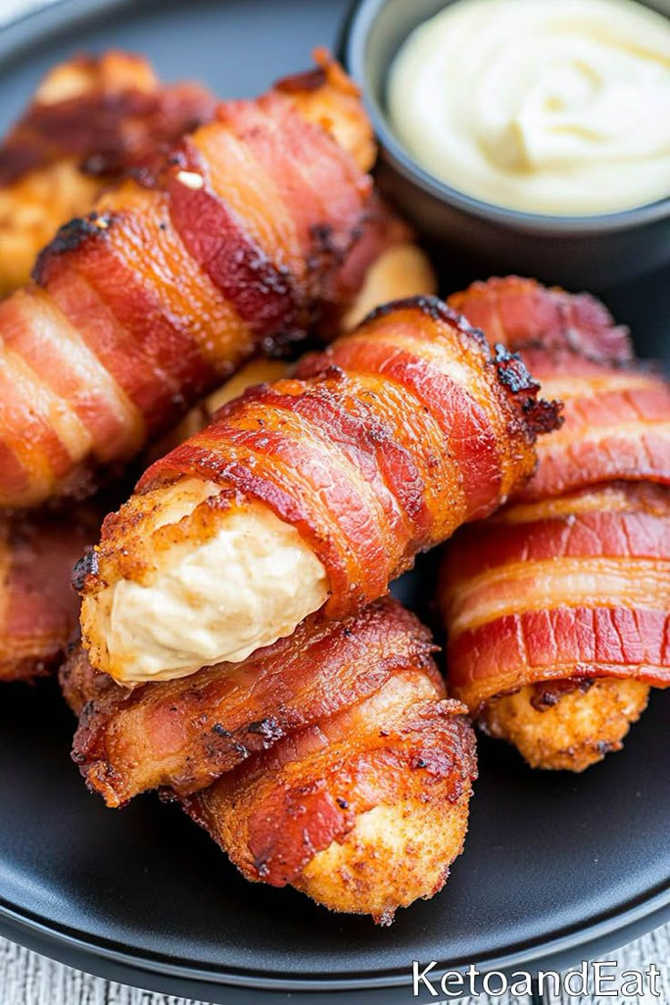 bacon wrapped in bacon on a plate with ranch dip