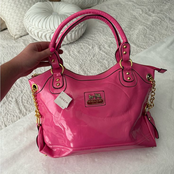 Nwt Coach Bag Color: Pink Never Worn This Stunner So She’s In Excellent Condition! Willing To Negotiate Price - No Trades! Pink Tote Shoulder Bag, Trendy Coach Shoulder Bag With Double Handle, Pink Bags With Branded Hardware For Everyday Use, Pink Shoulder Bag With Branded Hardware For Errands, Pink Satchel With Gold-tone Hardware For Errands, Coach Purple Bag For Errands, Everyday Purple Bags With Branded Hardware, Pink Coach Shoulder Bag For Errands, Purple Shoulder Bag For Shopping