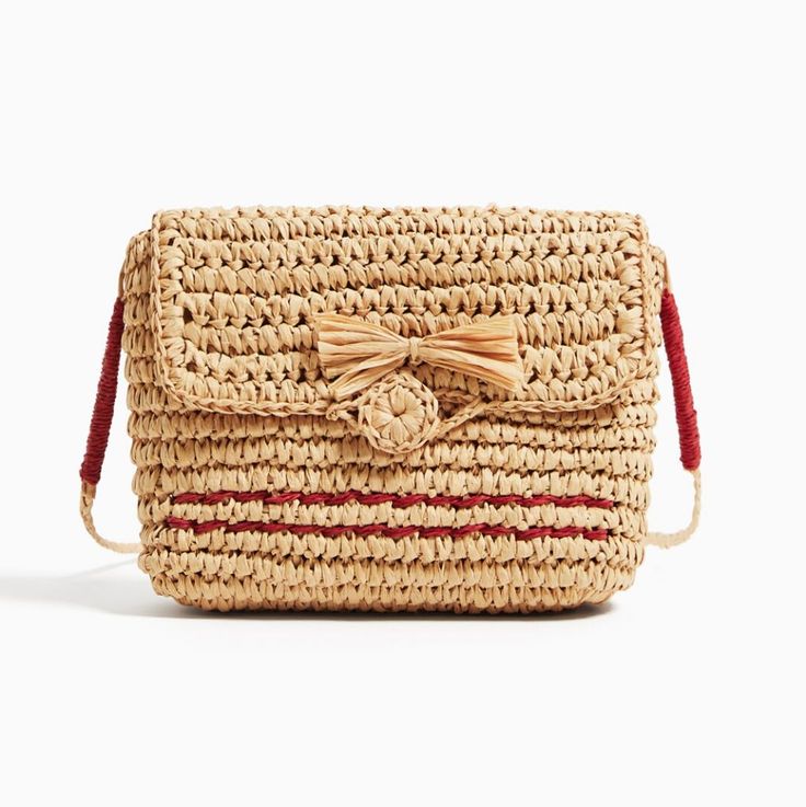 New With Tags. Part Of The Zara Kids Bags Collection, This Super Cute Raffia Flap Bag Features A Pop Of Red Contrast Against The Natural Straw Color. Flap Closes With A Matching Raffia Button At The Front. Fringe-Y Bow Style Knot Detail At The Front Adds An Extra Touch For That Slightly Elevated Look. Works Just As Well For Adults As For Kids! Cute Red Shoulder Bag With Adjustable Strap, Summer Gift Red Shoulder Bag, Summer Red Shoulder Bag As A Gift, Red Shoulder Bag For Summer Gift, Summer Gift: Red Shoulder Bag, Zara Brown Shoulder Bag For Beach, Red Straw Vacation Bags, Zara Casual Crossbody Shoulder Bag, Red Straw Bags For Vacation