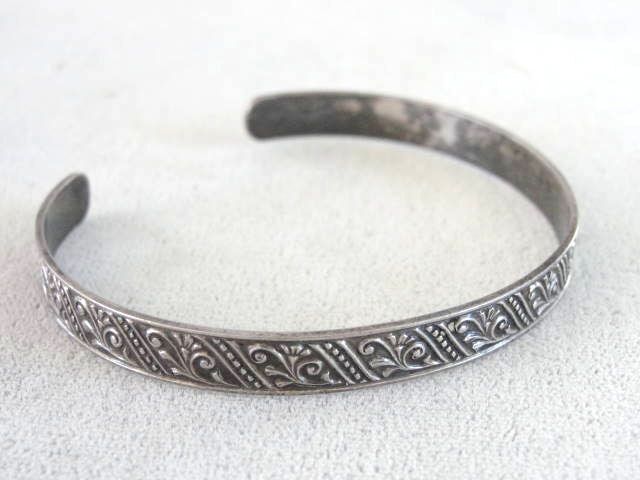 Signed LADY vintage FAYRE sterling silver decorated bracelet cuff bangle. Measures 1/4 inch x 6 1/8 inches to ends. Has a 1 inch opening. Adjust to your wrist. Very pretty victorian design. Has a beautiful soft patina. We have not polished this piece.  Stamped near one end on the reverse, STERLING, LADY FAYRE. Luxury Vintage Sterling Silver Cuff Bracelet, Vintage Bangle Bracelets, Silver Bangle Bracelet, Sterling Silver Bangle Bracelets, Vintage Bangles, Victorian Design, Sterling Silver Bangle, Sterling Silver Cuff Bracelet, Bracelet Cuff