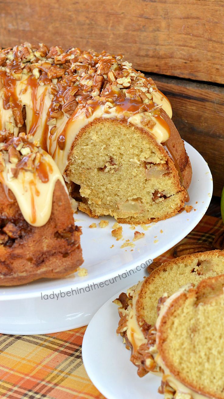 a bundt cake with caramel and pecans on top