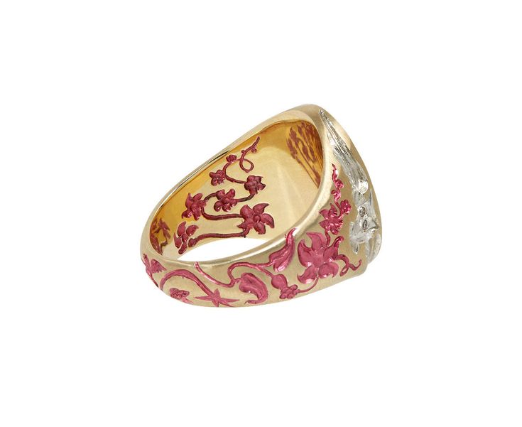 Awe-inspiring with its intricate, hand-carved details, this Castro Smith signet ring is the perfect combination of color and materials. The 9K yellow gold ring has been meticulously engraved with a smiling crescent moon on its front alongside a tiny, diamond set flower. A wings spread owl is engraved on either side next to swirling blossoms. The flowers have each been painted with bright pink lacquer, creating an edgy, nature-inspired ring. One tiny diamond accents the piece for a hint of shimme Castro Smith, Jewelry Facts, Daniela Villegas, Twist Jewelry, Zoe Chicco, Tiny Diamond, Single Stone, Diamond Set, Yellow Gold Ring