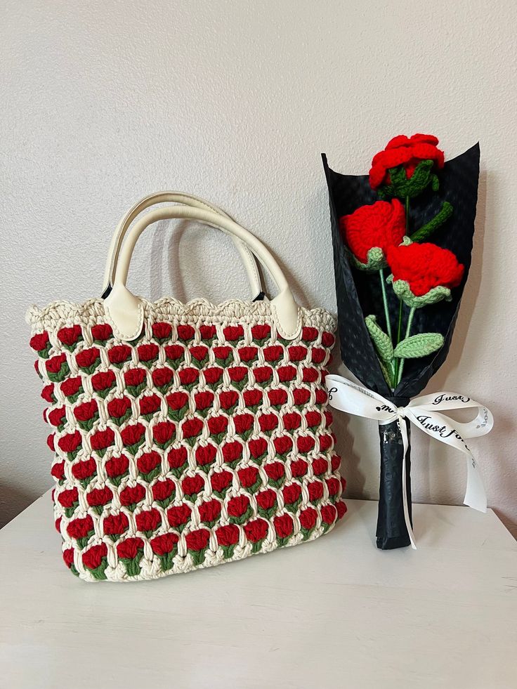 free shipping on orders over $39 for a hand-crocheted tulip tote bag, which is hand-washable and air-dryable. I will be traveling and will not send packages until September 1, 2024. Tulip Stitch, Stitch Bag, Crochet Tulip, Send Package, Knitting Tote, Bag Knitting, Bag Flower, September 1, Handmade Bag