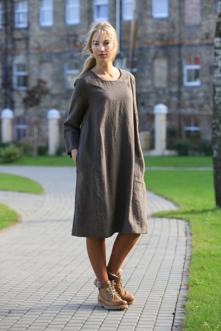 "Handcrafted Oeko-Tex Standard certified 100% European linen smock dress ideal for everyday wear. Perfect for springtime or chilly summer days. Always dress to kill! Neckline: round Silhouette: shift Length: ±41\"/105cm (we can make adjustments) Sleeve length: 3/4 Pockets: side seam Details: *Colour shown: wood brown *Model is wearing size M *Medium weight *Maternity-friendly *Relaxed fit *Not-ironed (and no need to) *Handmade by @LinenCloud Easy care: - Machine wash gentle - Wash seperately or Casual Linen Midi Dress For Spring, Spring Linen Shift Midi Dress, Linen Shift Midi Dress For Spring, Casual Knee-length Linen Shift Dress, Casual Knee-length Shift Linen Dress, Casual Knee-length Linen Dress For Day Out, Casual Linen Shift Midi Dress, Casual Linen Midi Dress For Day Out, Casual Linen Dress For Spring Day Out