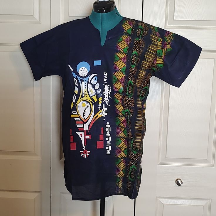 Dashiki Men Shirt Women Top Adire Kampala Haute Blouse Batik Size 10/12. This Is A Very Beautiful Handmade African Kampala Adire, It Is Unisex. Measurements Laying Flat On The Floor Are: Length: 32" Pit To Pit: 21" Sleeve: 9" Waist: 21.5 Please Ask, If You Might Have Any Questions About The Shirt/ Blouse. Thanks For Viewing. Kampala Top For Men, Blouse Batik, Design Dresses, Handmade African, African Design Dresses, Men Shirt, African Design, Shirt Women, Blue Yellow