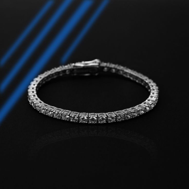 Tennis Bracelet | S925 Sterling Silver, Simulated Diamond Bracelet | Gifted Jewelry 𝐃𝐞𝐬𝐜𝐫𝐢𝐩𝐭𝐢𝐨𝐧 ✧ 𝐏𝐫𝐞𝐦𝐢𝐮𝐦 𝐐𝐮𝐚𝐥𝐢𝐭𝐲 𝐌𝐚𝐭𝐞𝐫𝐢𝐚𝐥: Crafted from high-quality S925 sterling silver for lasting shine and durability. ✧ 𝐂𝐮𝐛𝐢𝐜 𝐙𝐢𝐫𝐜𝐨𝐧𝐢𝐚 𝐒𝐭𝐨𝐧𝐞𝐬: Each CZ stone is carefully selected to mimic the brilliance of real diamonds, providing an ethical and affordable luxury. ✧ 𝐂𝐥𝐚𝐬𝐬𝐢𝐜 𝐒𝐭𝐲𝐥𝐞: The iconic tennis bracelet design ensures it complements any outfit. ✧ 𝐏𝐞𝐫𝐟𝐞𝐜𝐭 𝐆𝐢𝐟𝐭: Elegantly packaged, making it an ideal gift for any occasion. Elevate your style with our Tennis Bracelet, where sophistication meets affordability. 𝐒𝐩𝐞𝐜𝐢𝐟𝐢𝐜𝐚𝐭𝐢𝐨𝐧𝐬 − 𝐌𝐞𝐭𝐚𝐥: S925 Sterling Silver − 𝐅𝐢𝐧𝐢𝐬𝐡: Silver, Gold, Rose Gold − 𝐒𝐢𝐳𝐞: 6in, 7 Sterling Silver Diamond Cut Tennis Bracelet, Formal Sterling Silver Tarnish-resistant Bracelets, Sterling Silver Tarnish-resistant Bracelet For Formal Events, Sterling Silver Tarnish Resistant Bracelets For Formal Occasions, Formal Tarnish-resistant Sterling Silver Bracelet, Sterling Silver Tennis Bracelet With Diamond Accents, Tarnish Resistant White Gold Diamond Bracelet In Sterling Silver, Tarnish Resistant White Gold Diamond Bracelet, Tarnish-resistant White Gold Sterling Silver Diamond Bracelet