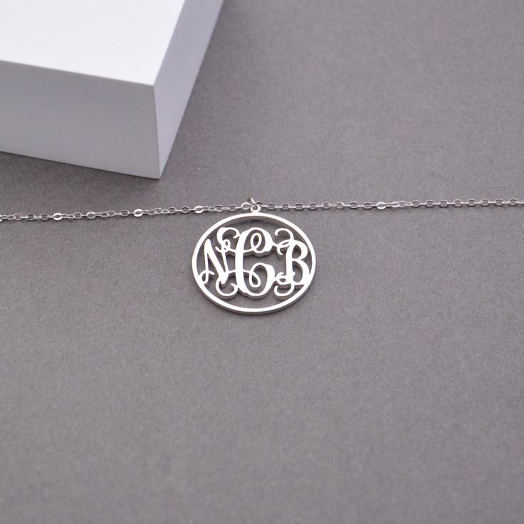 This personalized Monogram initials necklace is a unique and meaningful piece of jewelry that allows you to showcase your individuality and personal style,and makes the perfect birthday gift for her, Christmas gift, or anytime gift for that special someone in your life. ♥ Product Details ♥ ♦ Material:High Quality Solid 925 Sterling Silver/Stainless Steel Pendant Size: 1 inch ♦ Finish:Silver,18K Gold,Rose Gold. ♦ Necklace Length:14 inch to 22 inch,1 inch extension is available on all products. ♦ White Gold Initial Pendant Necklace For Gift, White Gold Initial Pendant Name Necklace As Gift, White Gold Initial Necklace For Mother's Day, Elegant Monogram Initial Necklace For Birthday, Mother's Day Gift Initial Necklace With Round Pendant, White Gold Initial Necklace For Gift, Elegant Monogram Necklace For Birthday, Silver Round Pendant Initial Necklace As Gift, Personalized White Gold Necklace