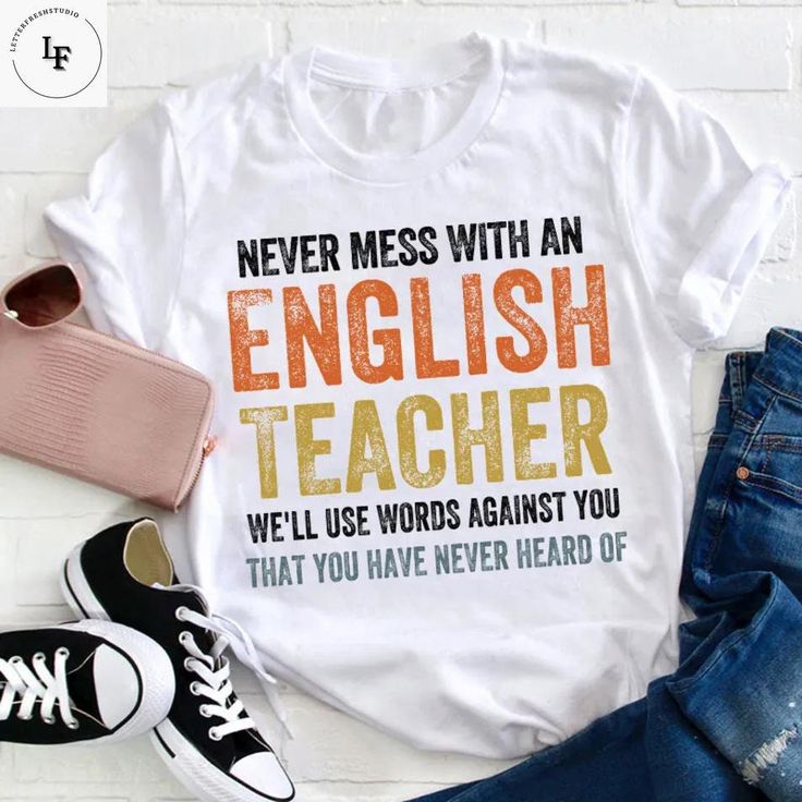 Product details:  TITLE NAME: Never Mess With An English Teacher Vintage T-Shirt, Teacher Shirt, Teacherlife Shirt, Teacher Lovers Shirt, English Teacher Shirt  IMPORTANT NOTE: Both Men and Women can we our shirts because this is unisex style t-shirts;  Wash item inside out in cold water, do not bleach, do not dry clean, do not iron directly on the design.  MATERIAL: 5.3-ounce, 100% cotton (99/1 cotton/poly (Ash) & 90/10 cotton/poly (Sport Grey); Heavyweight classic unisex tee; Taped neck and sh Funny Cotton T-shirt With Lettering, White T-shirt With Funny Text For Teacher Appreciation, English Teacher Shirt, Style T Shirts, Tee Shirt Designs, English Teacher, Teacher Tshirts, Unisex Style, Teacher Shirts