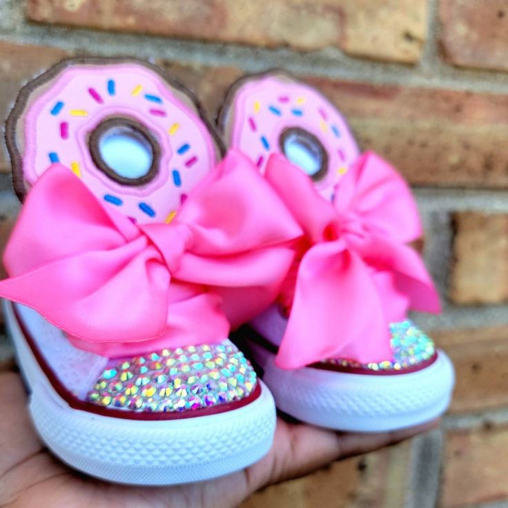 Donut Birthday Bling Shoes - Sprinkles Birthday Outfit Shoes - First Birthday  Custom Shoes - Frosting Bling Converse This listing is for a custom pair of shoes for a birthday or just because. The donut is pink, tan, purple and turquoise. The shoes are white and comes with ruffle Anklets in Pink. Your little one will love these shoes. Please do not leave children unattended while wearing the bling shoes due to the small pieces. All images are professionally pressed onto items.  These images are Pink Round Toe Sneakers For Birthday, Pink Lace-up Sneakers For Birthday, Pink Lace-up Sneakers For Gift, Pink Low-top Sneakers For Birthday, Fun High-top Sneakers For Birthday, Cute High-top Sneakers For Birthday, Cute High-top Sneakers For Parties, Cute Low-top Sneakers For Birthday, Cute Custom Pink Sneakers With Round Toe