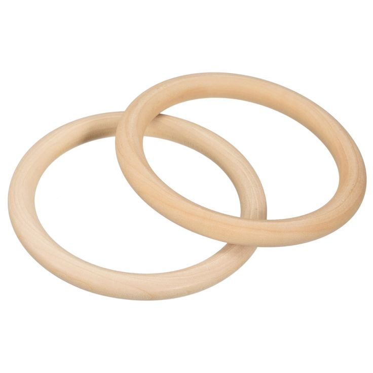 two wooden rings sitting on top of each other