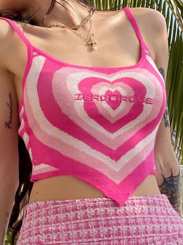 Pink Fitted Y2k Camisole, Pink Sleeveless Y2k Crop Top, Trendy Pink Summer Vest, Pink Y2k Style Sleeveless Camisole, Pink Y2k Cami Crop Top, Y2k Heart Print Top For Spring, Y2k Style Pink Summer Tank Top, Pink Heart Print Sleeveless Tops, Y2k Pink Tank Top For Summer