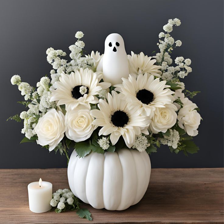 a white vase filled with flowers and a ghost