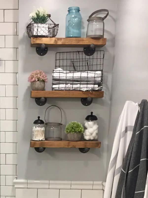 the bathroom is clean and ready to be used as a storage area for toiletries