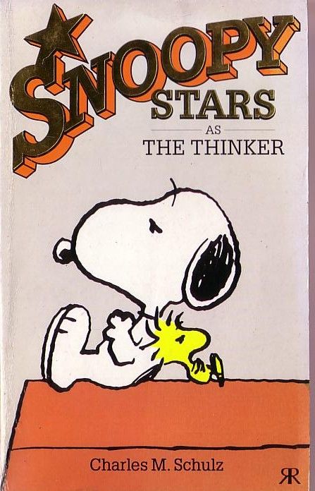 the book snoopy stars as the thinker by charles m schulz is on display