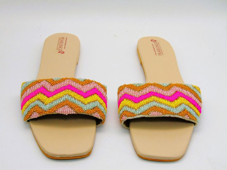 These espadrille like sandals are super cute for the summer, they offer a bright design of floral with leaves to add. These also have a beaded design on some of the flowers and leaves. They are also super comfy with a comfortable sole to walk in all day. These would be cute for a picnic or a photoshoot. Don't miss out on these cute sandals! See our page for more of our collection of shoes we offer. We ship out in a timely matter, wrapped in care for a safe secure trip to your location. Thank you Flat Espadrilles For Spring And Summer, Spring Summer Flat Espadrilles, Spring Vacation Flats With Removable Insole, Embroidered Summer Flats, Spring Vacation Flat Espadrilles, Summer Embroidered Espadrilles With Round Toe, Closed Toe Flats For Spring Vacation, Spring Vacation Closed Toe Flats, Summer Beach Flats With Open Heel