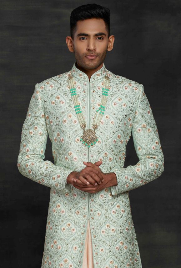 https://www.desiroyale.com/products/aqua-and-peach-mens-sherwani Pastel Green Sherwani Groom, Festive Pista Green Sherwani With Naqshi, Designer Festive Pista Green Sets, Pista Green Naqshi Sherwani For Wedding, Fitted Pista Green Kurta For Reception, Pista Green Long Sleeve Bandhgala With Intricate Embroidery, Traditional Green Nehru Jacket For Reception, Pista Green Embroidered Long Sleeve Sherwani, Pista Green Long Sleeve Embroidered Sherwani