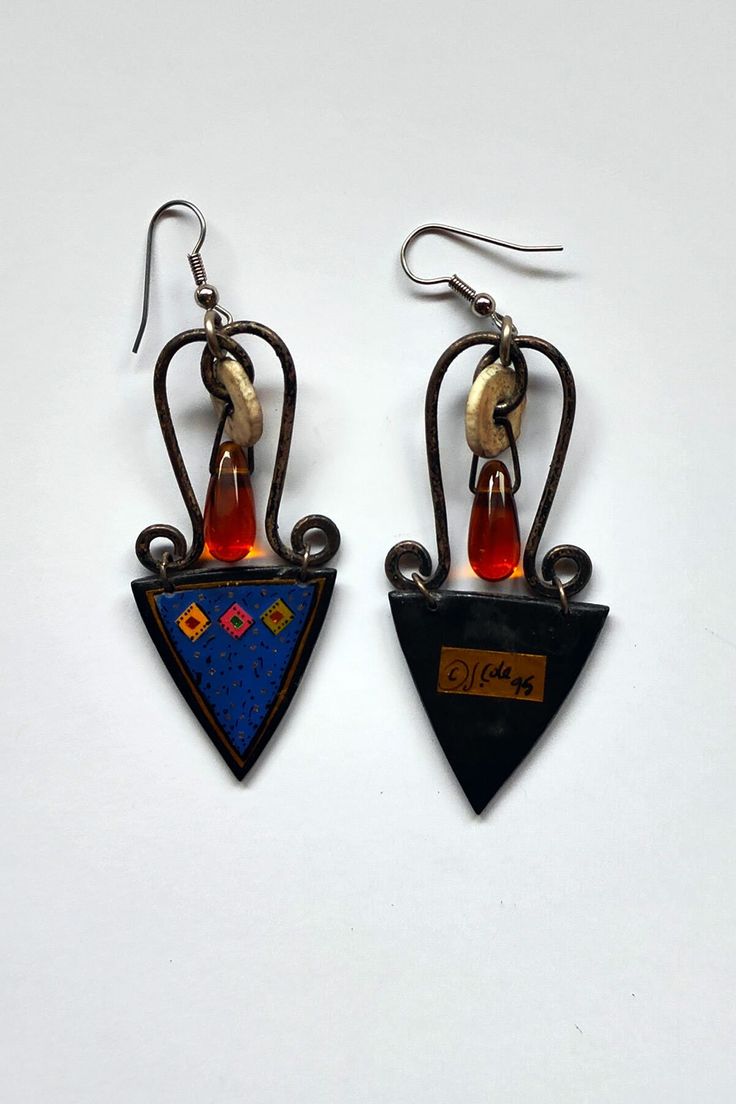 Vintage glass beads and J. Cole medallion earrings.   All earrings were created by artisan Jim Wright of Tempe AZ in the 80's and 90's.  Jim was an engineer whose skills included welding, metal and wood working, lost wax casting, enameling, drawing, painting and photo processing.  Jim's skills were enhanced when he began working with Bob Winston, a modernist jeweler, whose work is in the Smithsonian. More pictures can be provided upon request. Handmade Retro Metal Earrings, Handmade Metal Retro Earrings, Unique Glass Dangle Earrings, Handmade Vintage Teardrop Plug Earrings, Artisan Multicolor Glass Jewelry, Bohemian Hand-strung Recycled Glass Jewelry, Medallion Earrings, Vinyl Display, Vintage Hand-painted Enamel Earrings