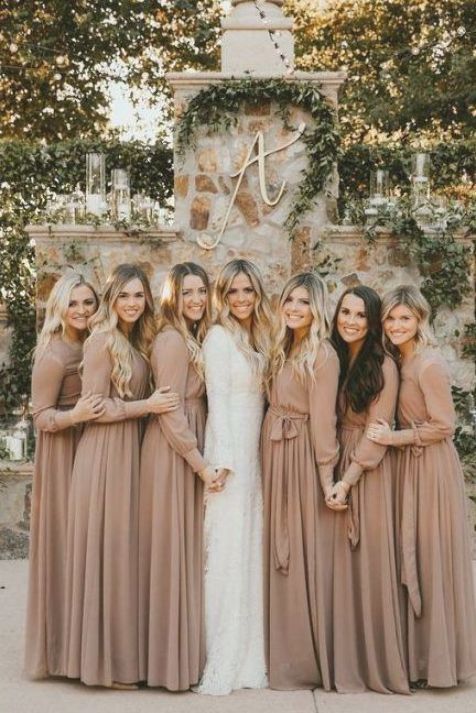 the bridesmaids are posing for a photo together