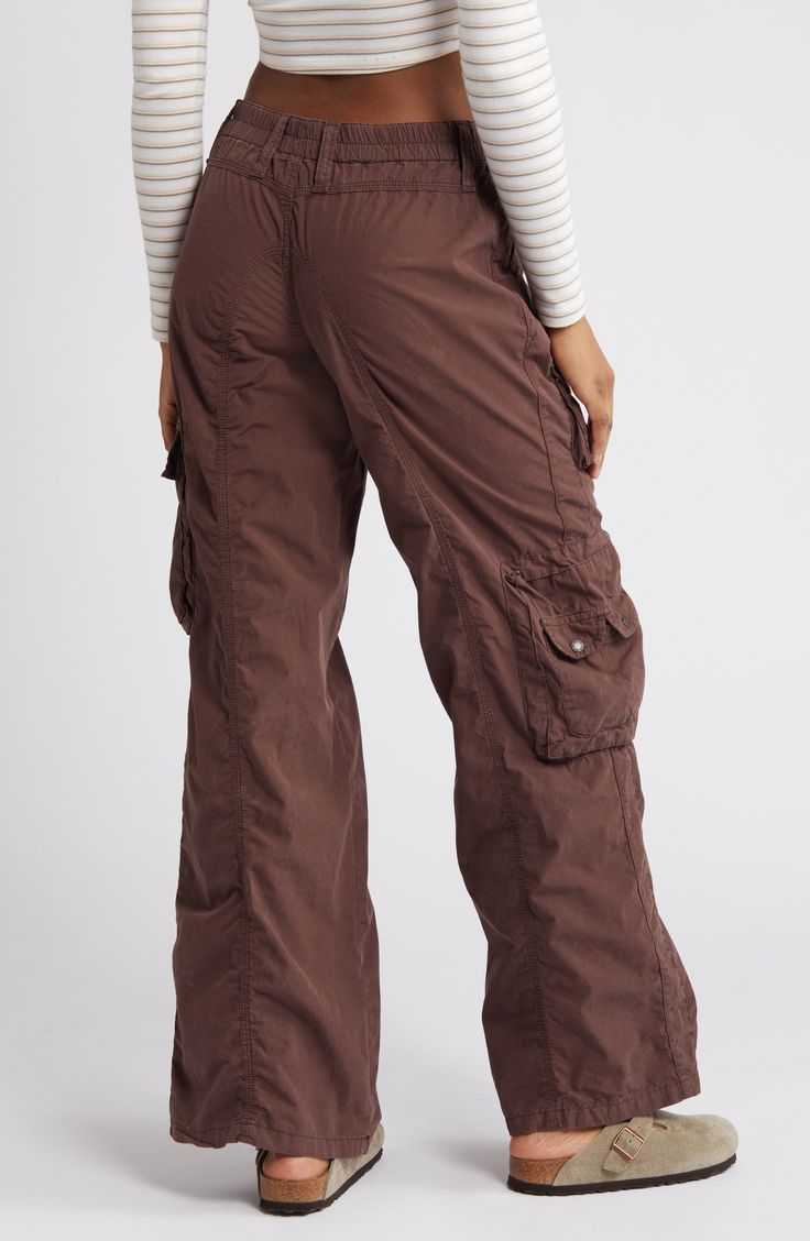 Tap into the retro look you missed the first time around in these all-cotton cargo pants featuring commodious bellows pockets to hold most everything you need. Exclusive retailer 31" inseam; 23 1/2" leg opening; 9 1/2" front rise; 13 1/2" back rise (size Medium) Back elastic waist 100% cotton Machine wash, line dry Made in Turkey Baggy Cargo Pants For Women, Y2k Parachute Pants With Pockets For Fall, Y2k Style Cotton Cargo Pants With Pockets, Y2k Cotton Cargo Bottoms, Y2k Cargo Jeans With Cargo Pockets, Y2k Style Cargo Jeans With Cargo Pockets, Y2k Cotton Parachute Pants With Pockets, Y2k Cargo Jeans With Pockets, Y2k Style Full Length Cargo Bottoms