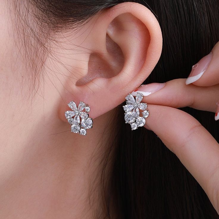 * These earrings are beautiful and easy to wear. They are not only suitable for everyday wear, but also for formal occasions. * A gift for your daughter, mother, and bestie，valentines gift, perfect gift. * The NortiaJewelry store has a lot of jewelry for women: https://www.etsy.com/shop/NortiaJewelry -- TECHNICAL  INFORMATION -- - Item ID：X000857277 - Product category：Earring - Product Color：Platinum Plated - Material：Alloy，zircon，glass - Earrings Width: 11mm  - Earrings Length: 15mm (All dimens Minimalist Earrings For Mother's Day, Hypoallergenic Cluster Earrings As Gift, Party Earrings For Mother's Day, Classic Cluster Earrings As Gift, Dainty White Gold Earrings For Mother's Day, Dainty Flower Earrings For Mother's Day Anniversary, Dainty Flower Earrings For Anniversary And Mother's Day, Elegant Single Cubic Zirconia Flower Earring, Flower-shaped Earrings As A Gift