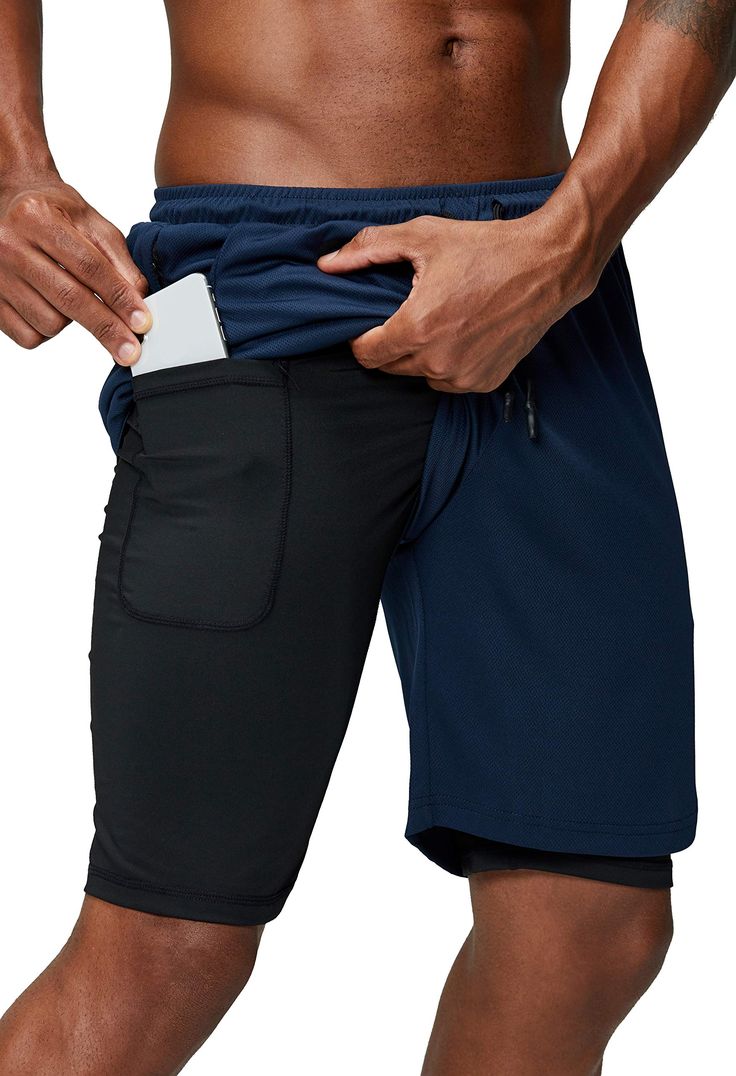 PRICES MAY VARY. Material: Outer Layer Shorts is mesh fabric featuring breathable and lite; built-in shorts is compression tights featuring stretch and smooth. 2 in 1 design: Sport shorts with super-elastic built-in compression support thigh muscles to enhance performance and provide greater flexibility for additional flexibility. Phone pocket and headphone jack: Built-in phone pocket makes your phone fit perfectly, with a unique headphone hole design that allows you to enjoy your music while yo Men's Lululemon Athletic Shorts For Workout, Men's Lululemon Moisture-wicking Athletic Shorts, Mens Workout Shorts Lululemon, Lululemon Men's Athletic Shorts For Workout, Lululemon Men's Athletic Workout Shorts, Cheap Men's Activewear Shorts, Gym Shorts Men, Workout Short, Running Shorts Men