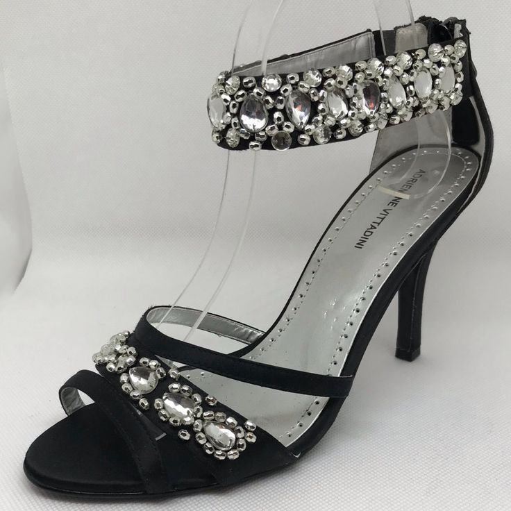 Adrienne Vittadini Gabrielle Black Rhinestone Dressy Strappy Sandal Stiletto Condition: New, Unworn Without Box Style: Gabrielle Color: Black Size: 9 Material: Satin Toe: Open Heel Height: 3.8in Original Price: $125 Stock Bin: 2 Stock Code: Blkh3.8inav9 Bedazzled Ankle Strap Heels For Evening, Fitted Rhinestone Sandals For Night Out, Embellished Fitted Heels For Gala, Fitted Embellished Heels For Gala, Embellished Party Sandals, Bedazzled Open Toe Evening Heels, Fitted Embellished Heels For Evening, Formal Embellished Fitted Sandals, Black Embellished Evening Sandals