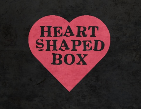 a heart shaped box with the words heart shaped box on it