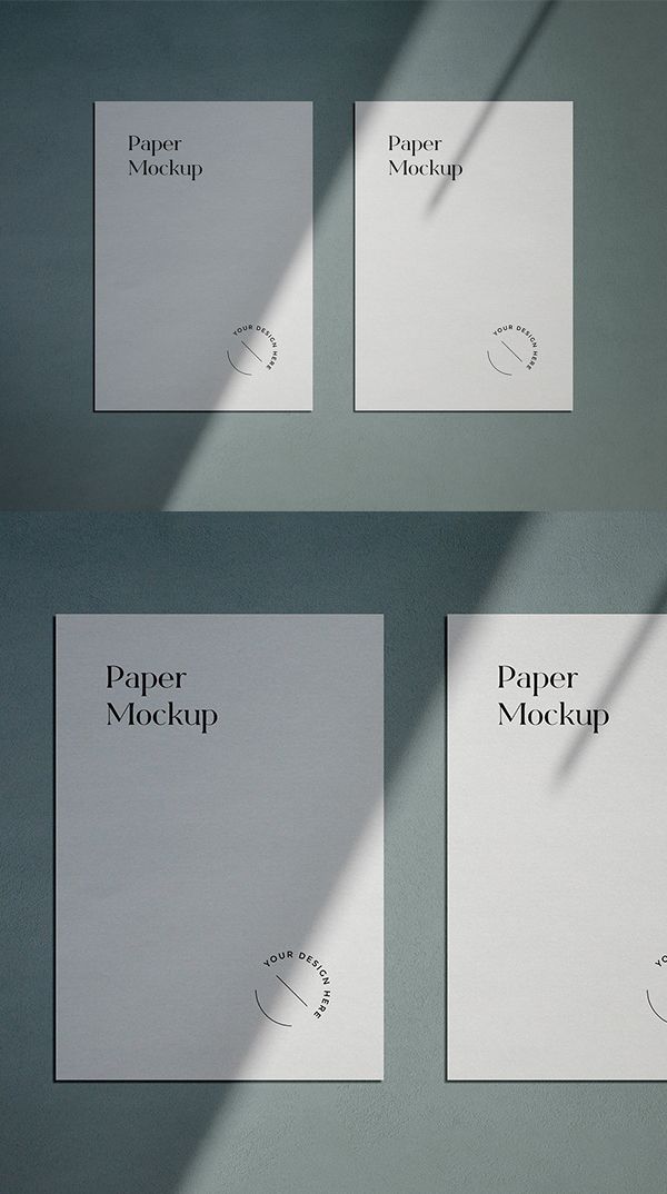 three sheets of paper with the words paper mockup on them