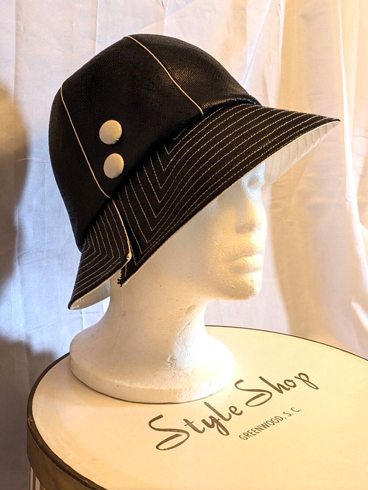 Vtg 1960's MR. JOHN Classic MOD Chic BLACK & White Patent Vinyl CLOCHE HAT W/BOX Modern Black Hats For Spring, Modern Black Spring Hats, Modern Black Hat With Flat Brim, Black Retro Bucket Hat For Summer, Modern Black Brimmed Hat, White Retro Bucket Hat With Curved Brim, Vintage Black Bucket Hat, Classic Black Adjustable Bucket Hat, Classic Adjustable Black Bucket Hat