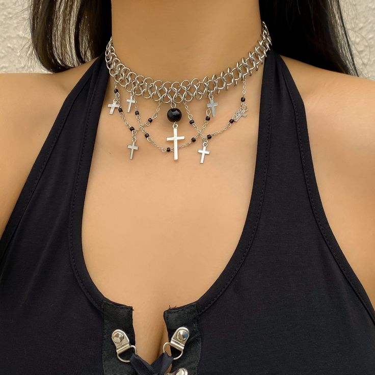 Description:Punk Layered Cross Tassel Collar Choker NecklaceSpecification:Size: 11.8" + 2.7" extWeight: 1.07 oz/pcsMaterial: alloy metal. glass seed beadChain colors: silverFeatures & Details:This punk style cross tassel collar choker necklace is made of nickel-free. lead-free. cadmium-free and hypoallergenic materials. which will not turn your skin green or cause anaphylactic reaction.It is easy to match your different outfits and also suitable for any occasions like wedding. banquet. costume p Layered Crosses, Collar Choker, Wedding Banquet, Choker Collar, Punk Style, Different Outfits, Punk Fashion, Choker, Tassels