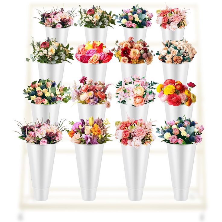 a bunch of vases filled with lots of different types of flowers in each one