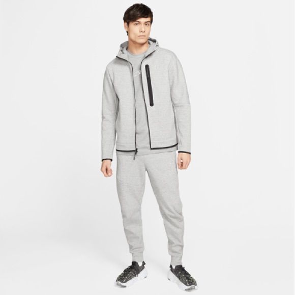 Men’s Nike 2 Separate Pieces Being Sold As A Set Jacket Full Zippered Hoodie - Smooth, Low Profile Fabric - Standard Fit - Front Pockets - 100% Sustainable Materials - Finished With Nike Grind Taping And Futura Logo Pants Slim Fit Tapered Leg Regular Length - Reflective Ticked Cotton Drawcord - Slashed Pockets 66% Cotton 34% Polyester Color May Differ Due To Lighting Winter Fleece Tracksuit In Athleisure Style, Fleece Moisture-wicking Tracksuit For Streetwear, Moisture-wicking Fleece Tracksuit For Streetwear, Sporty Fleece Tracksuit For Winter, Sporty Winter Fleece Tracksuit, Nike Sportswear Joggers For Outdoor, Nike Joggers For Outdoor Sportswear, Nike Outdoor Sportswear Joggers, Gray Athleisure Tracksuit With Drawstring Hood