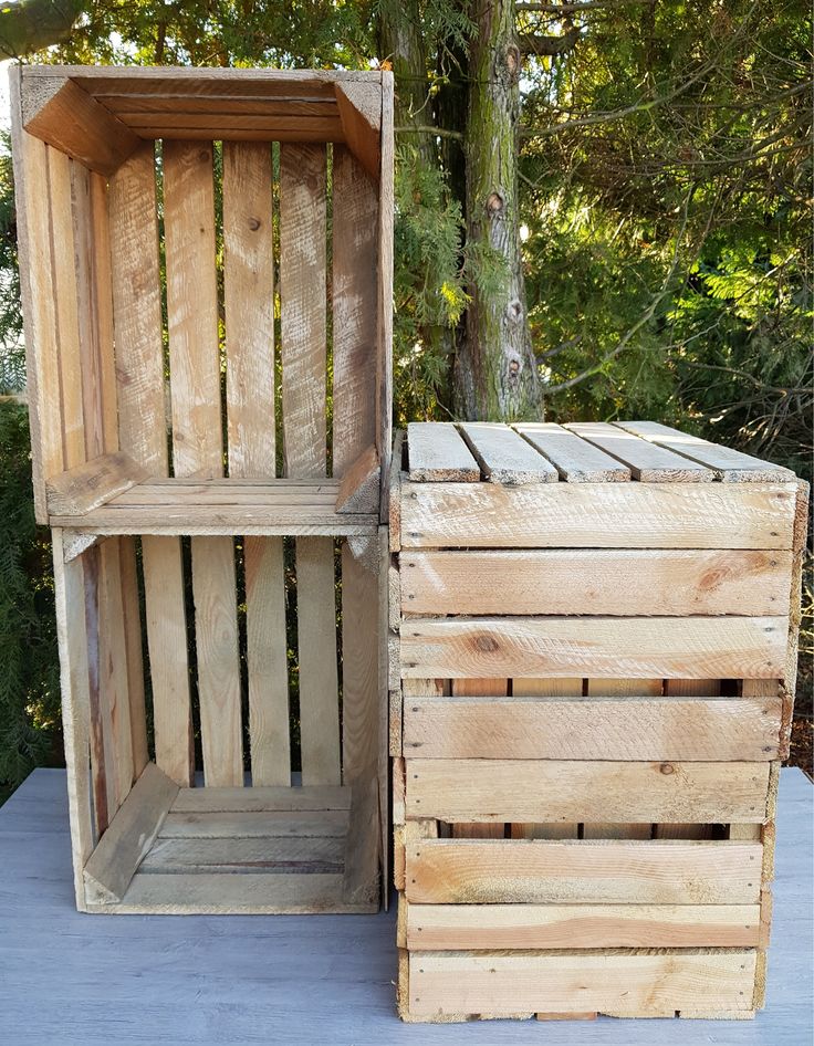 two wooden crates sitting next to each other