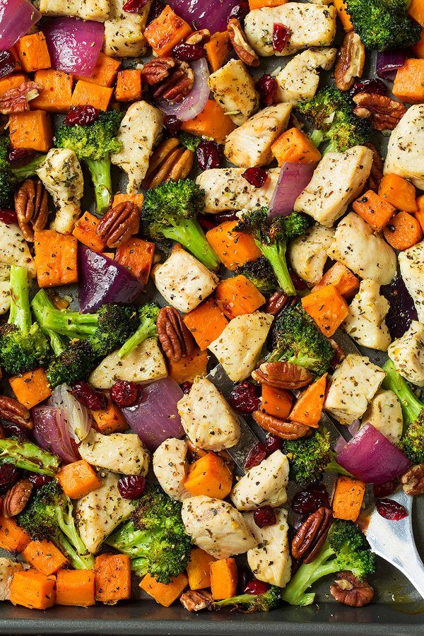 a sheet pan filled with chicken, broccoli and sweet potato casserole