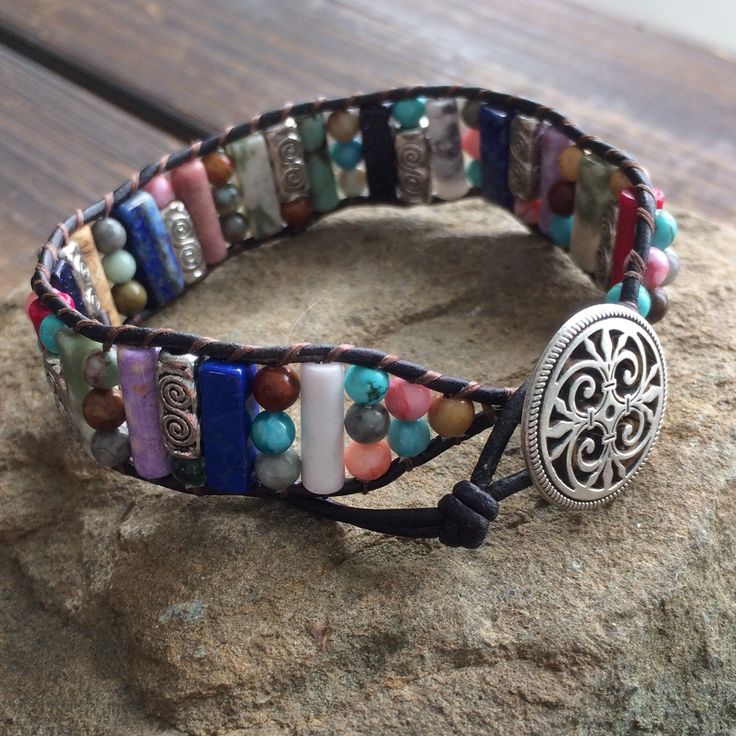 This multi color beaded bracelet for women is stunning and unique. This single wrap bracelet would compliment and outfit you want to wear it with. This bracelet would be a beautiful meaningful gift for your mother on Mother's Day. It will be a gift she can enjoy every day. This leather beaded bracelet is made with a variety of gemstone beads in various sizes and colors. Please choose the size you would like at check out. Multicolor Natural Stones Friendship Bracelets, Bohemian Multicolor Round Beads Wrap Bracelet, Adjustable Multicolor Spiritual Cuff Bracelet, Adjustable Multicolor Bohemian Wrap Bracelet, Multicolor Hand Wrapped Wrap Bracelet For Festival, Multicolor Hand Wrapped Crystal Bracelet, Healing Multicolor Hand-strung Friendship Bracelets, Hand Wrapped Multicolor Crystal Bracelet, Adjustable Colorful Beads Wrap Bracelet