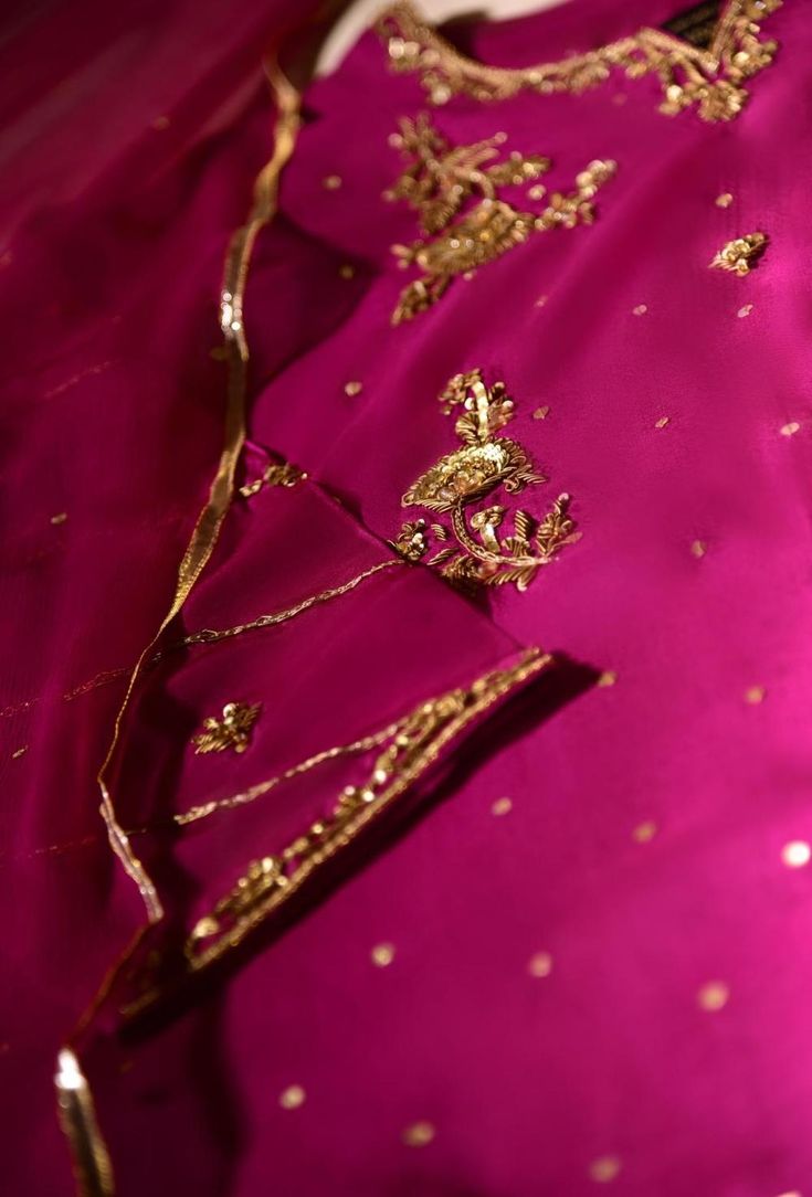 Indulge in " Magenta Jewel " rendered in pure raw silk 80 gms with delicate zardosi work in gold+antique paired with ( pure ) chiffon dupatta and raw silk trousers with handwork. No matter the event, this ethereal look is sure to turn heads.   Delivery Time:  4 to 6 weeks Diwali Tissue Silk Sharara With Gota Work, Festive Tissue Silk Sharara With Gota Work, Traditional Silk Anarkali Set With Gota Work, Traditional Drape Sharara With Dori Work, Eid Traditional Wear With Gota Work On Tissue Silk, Silk Traditional Wear With Sheer Dupatta For Diwali, Festive Raw Silk Sharara With Gota Work, Festive Gota Work Sharara In Raw Silk, Silk Churidar With Gota Work For Eid