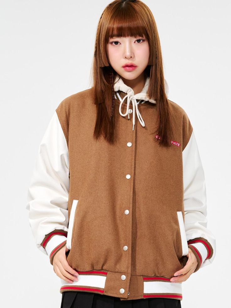 It is a casual and stylish varsity jacket with colorblock point. Made of wool blend fabric, it is comfy and cozy. The jacket has cute artwork patches and logo embroidery on the back. It has colorblock sleeves and stripe point on the ribbed parts.- Oversized fit- Ribbed neck, cuffs, hem- Snap button closure- Side pockets Winter Varsity Jacket With Patchwork And Baseball Collar, Winter Varsity Jacket With Patchwork, Trendy Winter Varsity Jacket With Contrast Color, Varsity Cotton Outerwear With Striped Cuffs, Fall Varsity Outerwear With Contrast Stripes, Fall Varsity Jacket For Campus, Fall Outerwear With Contrast Stripes, Varsity Style Long Sleeve Outerwear With Contrast Color, Sporty Varsity Jacket With Contrast Color For Fall