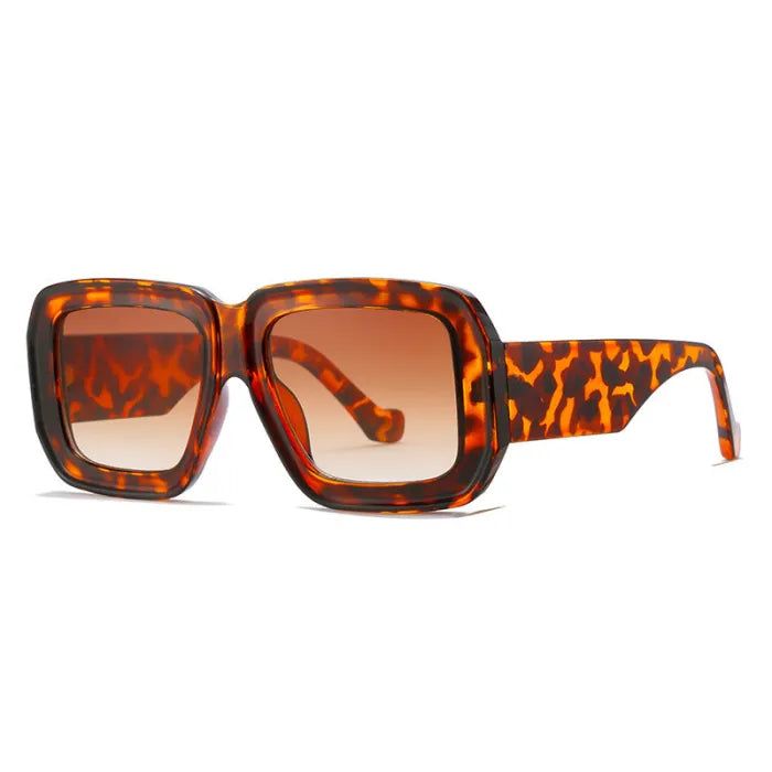 Step into the future with our Y2K Oversized Square Thick Flat Top Sunglasses! These unique shades offer both style and protection with their oversized shape and thick frame. The funky print adds a touch of playfulness to any outfit. Upgrade your look and make a statement with these stylish sunglasses. Retro Shield Sunglasses With Uva Protection For Vacation, Retro Shield Sunglasses With Uv Protection For Vacation, Retro Shield Sunglasses With Mirrored Lenses For Vacation, Outfit Upgrade, Flat Top Sunglasses, Top Sunglasses, Upgrade Your Look, Into The Future, Stylish Sunglasses